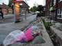 Flowers have been left near the site in south London where a British soldier was hacked to death Wednesday.