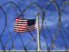 An American flag flying over Camp VI, where detainees are housed at the U.S. Naval Base at Guantanamo Bay.