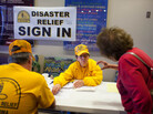 Sue McClure, a volunteer with Disaster Relief of Oklahoma, assists tornado victims Wednesday at the First Baptist Church in Moore, Okla. Sue McClure, a volunteer with Disaster Relief of Oklahoma, assists tornado victims Wednesday at the First Baptist Church in Moore, Okla.