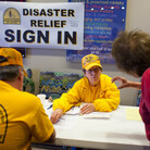 Sue McClure, a volunteer with Disaster Relief of Oklahoma, assists tornado victims Wednesday at the First Baptist Church in Moore, Okla. Sue McClure, a volunteer with Disaster Relief of Oklahoma, assists tornado victims Wednesday at the First Baptist Church in Moore, Okla.