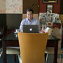 Nay Aung, founder of Oway, a tech startup in Yangon, Myanmar, sits in Taste Cafe, which served as his unofficial office for his first few months in the country. He had to start his business here because it was one of the few places with a stable Internet connection.
