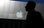 A person walks by an Apple Store on April 23, 2013 in San Francisco, California.