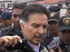 Former Guatemalan President Alfonso Portillo speaks with journalists in Guatemala City before boarding a plane for the U.S. on Friday. Former Guatemalan President Alfonso Portillo speaks with journalists in Guatemala City before boarding a plane for the U.S. on Friday.