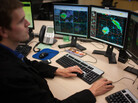 Marc Austin monitors radar and issues warnings at the National Weather Center in Norman, Okla., on Thursday. Marc Austin monitors radar and issues warnings at the National Weather Center in Norman, Okla., on Thursday.