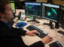 Marc Austin monitors radar and issues warnings at the National Weather Center in Norman, Okla., on Thursday.