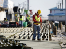 Construction workers work to rebuild the boardwalk in Seaside Heights in anticipation of Memorial Day weekend. Construction workers work to rebuild the boardwalk in Seaside Heights in anticipation of Memorial Day weekend.