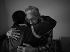 Frankie Kuzuguk, 82, gets a hug from his daughter Marilyn Kuzuguk at Quyanna Care Center in Nome, Alaska, after receiving an official honorable discharge and a distinguished service coin from visiting Veterans Affairs officials. The VA is still tracking down the few surviving members of the World War II Alaska Territorial Guard or delivering benefits to their next of kin. Frankie Kuzuguk, 82, gets a hug from his daughter Marilyn Kuzuguk at Quyanna Care Center in Nome, Alaska, after receiving an official honorable discharge and a distinguished service coin from visiting Veterans Affairs officials. The VA is still tracking down the few surviving members of the World War II Alaska Territorial Guard or delivering benefits to their next of kin.