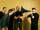 Modest Mouse frontman Isaac Brock uses a massive ear trumpet to really listen. Modest Mouse frontman Isaac Brock uses a massive ear trumpet to really listen.