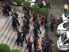 Chinese police lead a group of defendants, including millionaire and politician Li Qiang, to court on organized crime charges in 2009. Many of those arrested in now-imprisoned politician Bo Xilai's campaign against the mafia still remain in jail, despite serious legal questions about the process. Chinese police lead a group of defendants, including millionaire and politician Li Qiang, to court on organized crime charges in 2009. Many of those arrested in now-imprisoned politician Bo Xilai's campaign against the mafia still remain in jail, despite serious legal questions about the process.