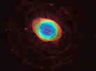 The famous Ring Nebula is shown here in striking detail, in a composite image made from images from NASA's Hubble Space Telescope and infrared data from telescopes on Earth. The famous Ring Nebula is shown here in striking detail, in a composite image made from images from NASA's Hubble Space Telescope and infrared data from telescopes on Earth.