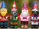 Decorated gnomes designed by celebrities, including Elton John (second from the right), are displayed at Chelsea Flower Show on Monday in London. Decorated gnomes designed by celebrities, including Elton John (second from the right), are displayed at Chelsea Flower Show on Monday in London.