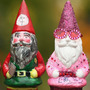 Decorated gnomes designed by celebrities, including Elton John (second from the right), are displayed at Chelsea Flower Show on Monday in London.