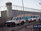 Red Cross vehicles outside Israel's Ofer prison, between Jerusalem and Ramallah. Red Cross vehicles outside Israel's Ofer prison, between Jerusalem and Ramallah.