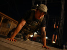 U.S. Army Sgt. Michael Johnson trains at Bagram Air Field for the Memorial Day Murphy, a CrossFit workout honoring a Navy SEAL killed in Afghanistan in 2005. U.S. Army Sgt. Michael Johnson trains at Bagram Air Field for the Memorial Day Murphy, a CrossFit workout honoring a Navy SEAL killed in Afghanistan in 2005.