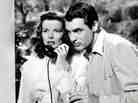 Katharine Hepburn and Cary Grant in The Philadelphia Story, in which Cary Grant is very charming.