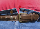 A straining, too-small belt A straining, too-small belt