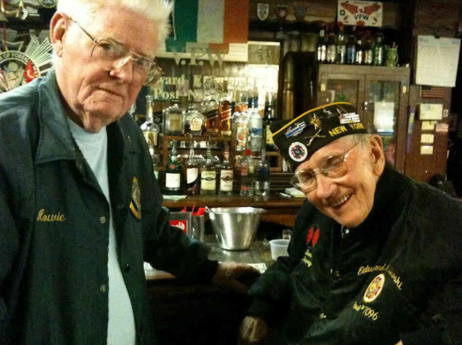 Navy veteran Howard Dunn and Army veteran Tom Kaine remember when the Red Cross briefly charged servicemen for doughnuts during World War II. Many veterans still resent it. Navy veteran Howard Dunn and Army veteran Tom Kaine remember when the Red Cross briefly charged servicemen for doughnuts during World War II. Many veterans still resent it.
