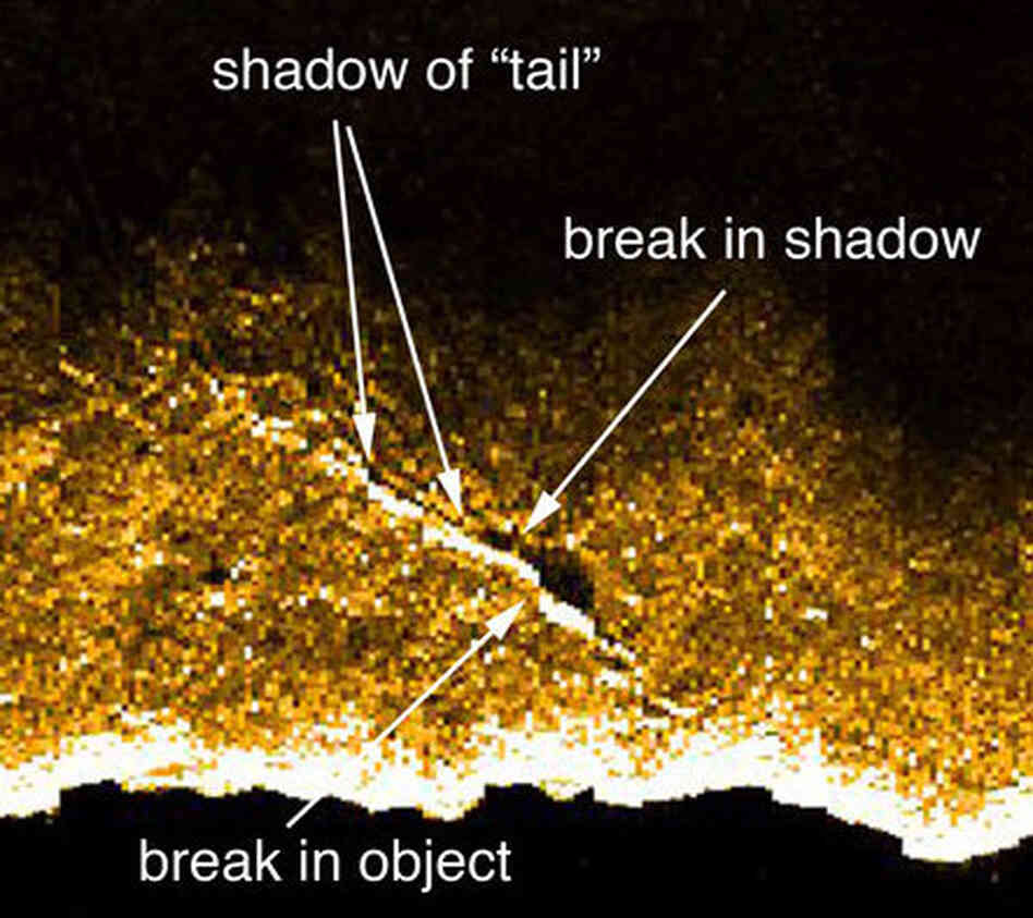 In this photo illustration, researchers have added pointers to what they say might be places where Earhart's plane broke up as it settled on an underwater cliff. In this photo illustration, researchers have added pointers to what they say might be places where Earhart's plane broke up as it settled on an underwater cliff.