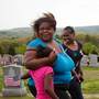 Michelle Williams (center) and two daughters visit the grave of her mother, Judy Williams, at Fairview Cemetery in Hyde Park, Mass., on May 11. Judy died in 2011. Michelle Williams (center) and two daughters visit the grave of her mother, Judy Williams, at Fairview Cemetery in Hyde Park, Mass., on May 11. Judy died in 2011.