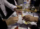 Diners drinking raki, a traditional Turkish alcoholic drink flavored with anise, at a restaurant in Istanbul. Diners drinking raki, a traditional Turkish alcoholic drink flavored with anise, at a restaurant in Istanbul.