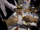 Diners drinking raki, a traditional Turkish alcoholic drink flavored with anise, at a restaurant in Istanbul. Diners drinking raki, a traditional Turkish alcoholic drink flavored with anise, at a restaurant in Istanbul.
