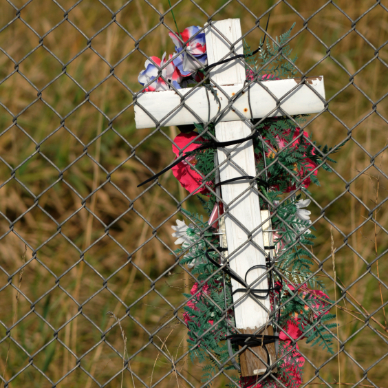 Cross on a fence