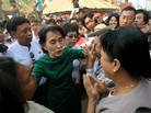 Myanmar opposition leader Aung San Suu Kyi has been under fire for working with the government on a number of issues. Here, she meets in March with protesters who oppose a copper mine backed by Chinese investors. She supports the mining project. Myanmar opposition leader Aung San Suu Kyi has been under fire for working with the government on a number of issues. Here, she meets in March with protesters who oppose a copper mine backed by Chinese investors. She supports the mining project.