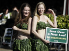 PETA members hold placards on the street in Johannesburg. PETA members hold placards on the street in Johannesburg.