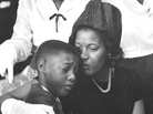 Medgar Evers' widow, Myrlie, comforts the couple's 9-year-old son, Darrel, at her husband's funeral in Jackson, Miss., on June 15, 1963. Medgar Evers' widow, Myrlie, comforts the couple's 9-year-old son, Darrel, at her husband's funeral in Jackson, Miss., on June 15, 1963.