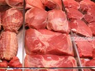 Cuts of beef and pork lie in a display counter at a supermarket in Berlin, Germany. Cuts of beef and pork lie in a display counter at a supermarket in Berlin, Germany.