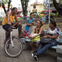 Residents socialize and children play in the tranquil plaza of Mage, a small town that has seen an increase in violence as pacification efforts in Rio de Janeiro are forcing drug traffickers out of the capital's favelas, or shantytowns. Residents socialize and children play in the tranquil plaza of Mage, a small town that has seen an increase in violence as pacification efforts in Rio de Janeiro are forcing drug traffickers out of the capital's favelas, or shantytowns.