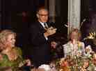 Henry Kissinger delivers a toast during dinner at Sunnylands. Carol Price is at left.