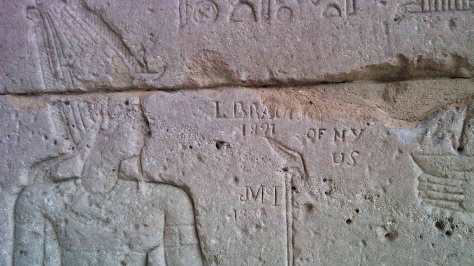 A graffito that says "L. Brad— 1821 of NY US". A graffito that says "L. Brad— 1821 of NY US".