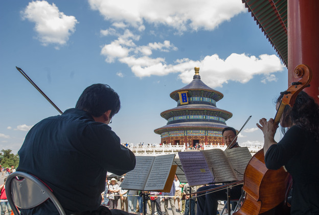 Artists from the Philadelphia Orchestra perform at the Temple of Heaven in Beijing, capital of China.