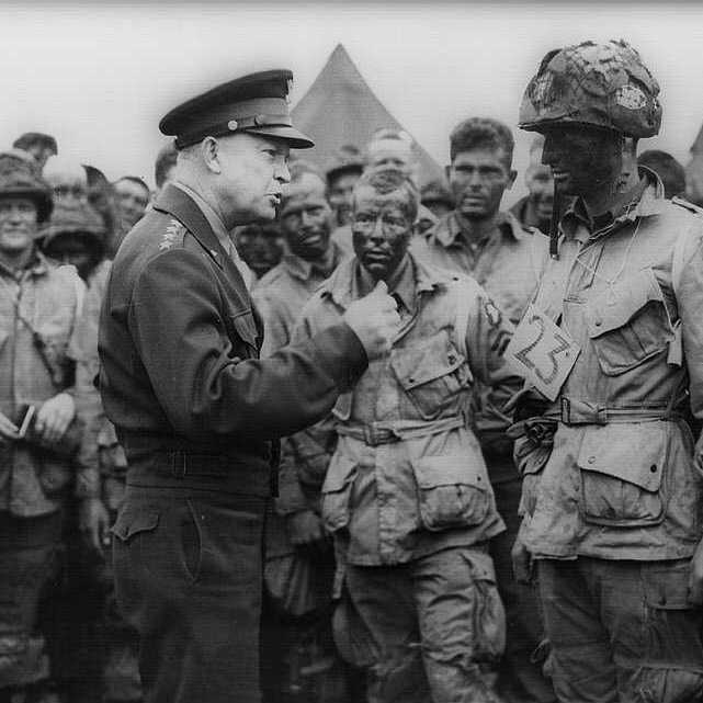 Gen. Dwight D. Eisenhower addresses American paratroopers in England on the evening of June 5, 1944, as they prepare for the Battle of Normandy.