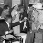President Kennedy passes out pens on June 10, 1963, after signing the Equal Pay Act. President Kennedy passes out pens on June 10, 1963, after signing the Equal Pay Act.