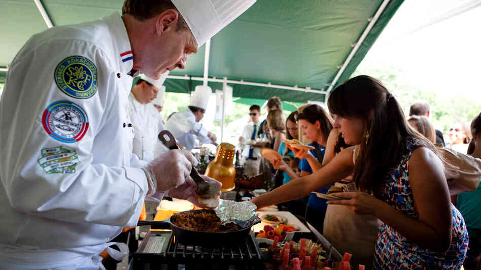Stefan Larsson serves up bison sloppy Joes and juniper-smoked bison tenderloin, which will be offered at the Yellowstone National Park this summer. Each park will have different menus featuring local foods. Stefan Larsson serves up bison sloppy Joes and juniper-smoked bison tenderloin, which will be offered at the Yellowstone National Park this summer. Each park will have different menus featuring local foods.