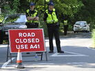What goes on up the road is only for those in the know to know: Police stood guard Thursday near the Grove Hotel in Watford, England, where "The Bilderberg" group is meeting this year. What goes on up the road is only for those in the know to know: Police stood guard Thursday near the Grove Hotel in Watford, England, where "The Bilderberg" group is meeting this year.