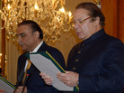 Newly elected Pakistani Prime Minister Nawaz Sharif (right) during a swearing in ceremony at the Presidential Palace in Islamabad on Wednesday. Sharif has vowed to end U.S. drone strikes in the country. Newly elected Pakistani Prime Minister Nawaz Sharif (right) during a swearing in ceremony at the Presidential Palace in Islamabad on Wednesday. Sharif has vowed to end U.S. drone strikes in the country.