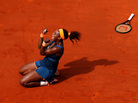 Serena Williams celebrates match point Saturday against Russian Maria Sharapova at Roland Garros in Paris. Serena Williams celebrates match point Saturday against Russian Maria Sharapova at Roland Garros in Paris.
