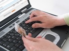 Hands on a keyboard. Hands on a keyboard.