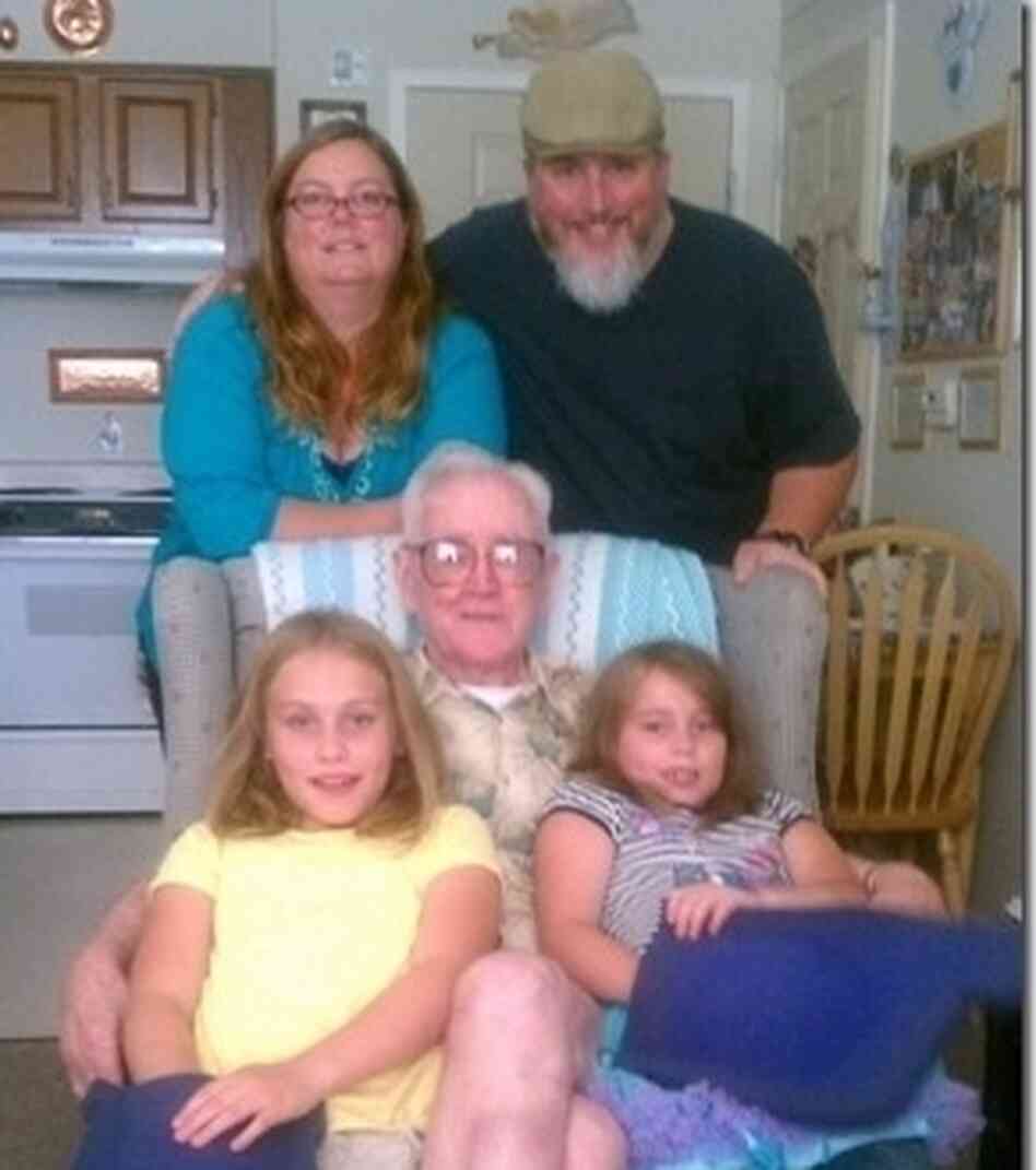 Michael and Katharine Powers don't expect to be able to retire. Here, they are with two of their daughters and Michael's grandfather. Michael and Katharine Powers don't expect to be able to retire. Here, they are with two of their daughters and Michael's grandfather.