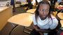 Recent high school graduate Dajina Bell got her diploma after working hard to turn around her GPA. An anonymous donor who heard her story on Colorado Public Radio set up a scholarship for her.