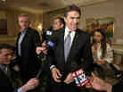 Texas Gov. Rick Perry meets with Illinois media during his April trip to lure businesses.