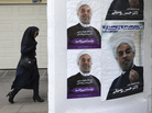 An Iranian woman walks past posters of presidential candidate Hasan Rowhani, a former top nuclear negotiator, next to his campaign headquarters, in Tehran, Iran, on June 1. Many Iranian women are concerned about the erosion of their opportunities. An Iranian woman walks past posters of presidential candidate Hasan Rowhani, a former top nuclear negotiator, next to his campaign headquarters, in Tehran, Iran, on June 1. Many Iranian women are concerned about the erosion of their opportunities.