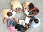 A group of young adults reading A group of young adults reading