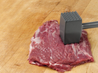 Meat tenderized the old-fashioned way. The industrial method is a mechanized process involving needles. Meat tenderized the old-fashioned way. The industrial method is a mechanized process involving needles.