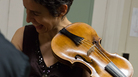Violinist Amandine Beyer holds Mozart's own violin backstage at Boston's Jordan Hall on Monday. Violinist Amandine Beyer holds Mozart's own violin backstage at Boston's Jordan Hall on Monday.