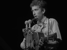 Bob Dylan performs at the Newport Folk Festival in 1963. His set included "Only a Pawn in Their Game," which he would also play at the 1963 March on Washington. Bob Dylan performs at the Newport Folk Festival in 1963. His set included "Only a Pawn in Their Game," which he would also play at the 1963 March on Washington.