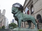 An oversized Chicago Blackhawks hockey helmet sits on one of the lion sculptures outside the entrance to the Art Institute of Chicago in celebration of the team's upcoming appearance in the Stanley Cup Final in Chicago. The Blackhawks host the Boston Bruins in Game 1 on Wednesday. An oversized Chicago Blackhawks hockey helmet sits on one of the lion sculptures outside the entrance to the Art Institute of Chicago in celebration of the team's upcoming appearance in the Stanley Cup Final in Chicago. The Blackhawks host the Boston Bruins in Game 1 on Wednesday.